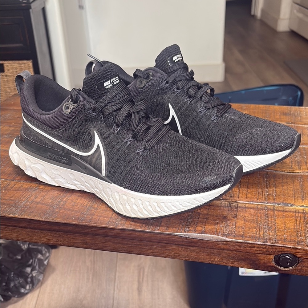 Nike Black and White Sneakers with Streamlined Design